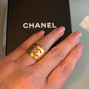 CHANEL Gold-Tone Wide CC Logo Ring with Pink Stones